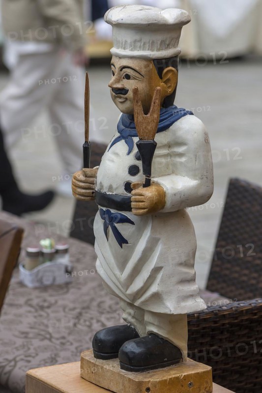 Cooking figure in front of a restaurant, Burano, Veneto, Italy, Europe