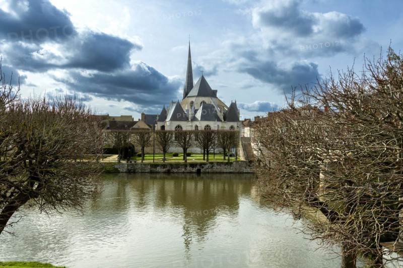 Nemours. Saint-Jean-Baptiste church on river Loing. Seine-et Marne department. Ile-de-France. France. Europe
