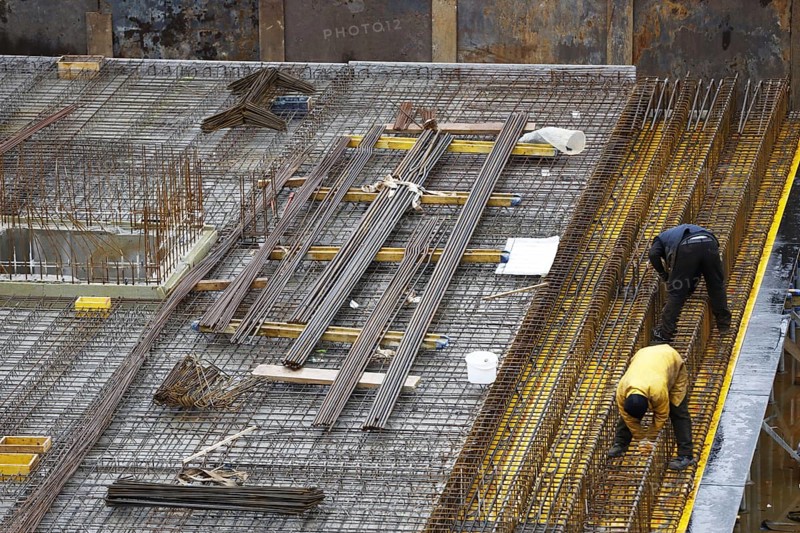 Construction site, reinforced concrete reinforcement bars, for a building ceiling, are installed