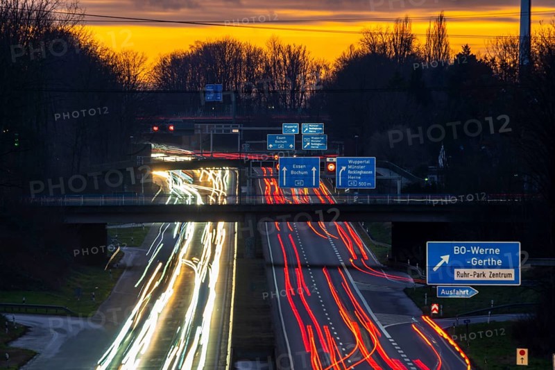Motorway A40, Ruhrschnellweg, near Bochum, dense evening traffic, in front of the motorway junction Bochum, A43, view in west direction, North Rhine-Westphalia, Germany, Europe