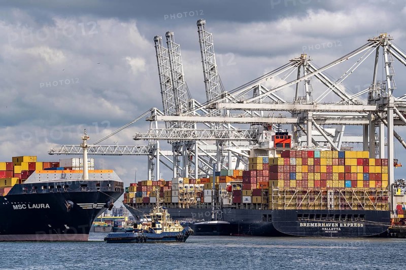 ECT Delta Container Terminal, in Europahaven, MSC Laura container freighter being towed by harbour tugs, Bremerhaven Express container ship being loaded and unloaded, seaport of Rotterdam, deep-sea port Maasvlakte 2, on an artificial land area, Netherlands