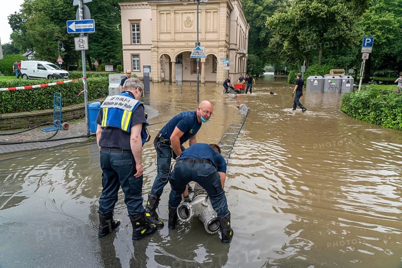 Flood on the Ruhr, after long heavy rainfall the river left its bed and flooded the countryside and villages, the highest water level ever recorded, the fire brigade pumps water out of the streets, Mülheim an der Ruhr, North Rhine-Westphalia, Germany, Europe