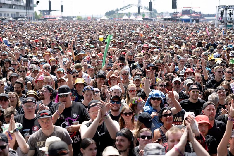 Adenau, Germany, 7 June 2024: Fans during the first day of Rock am Ring. The festival takes place at the Nürburgring race track near the town of Adenau from 7 to 9 June 2024, Europe