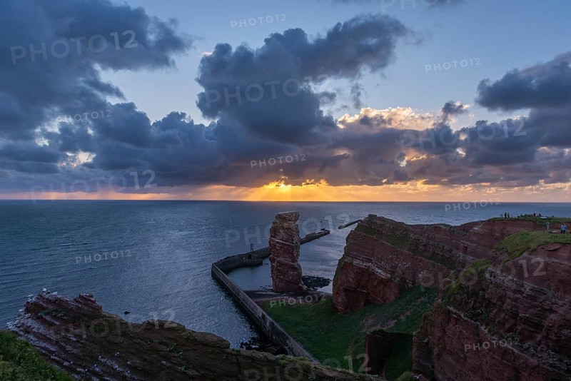 Evening shot, Lange Anna Felsen, red sandstone cliff, Lummenfelsen, cloudy sky, Helgoland Oberland, Helgoland, Schleswig-Holstein, Germany, Europe