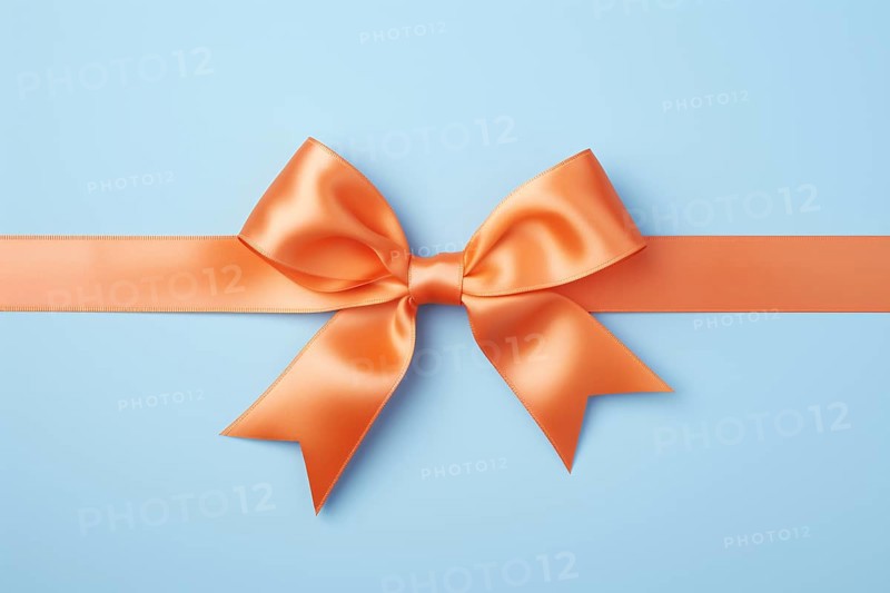 Orange tied silk ribbon on blue background. KI generiert, generiert, AI generated