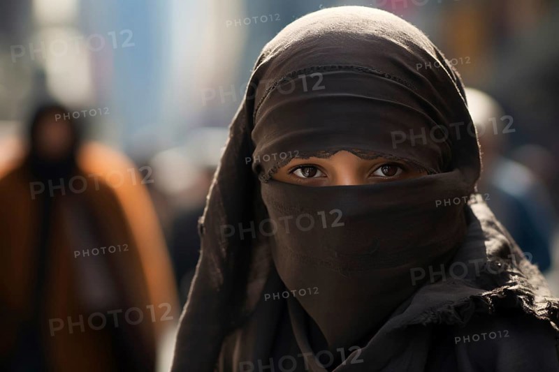 Muslim woman covering her face with burka in city. KI generiert, generiert AI generated