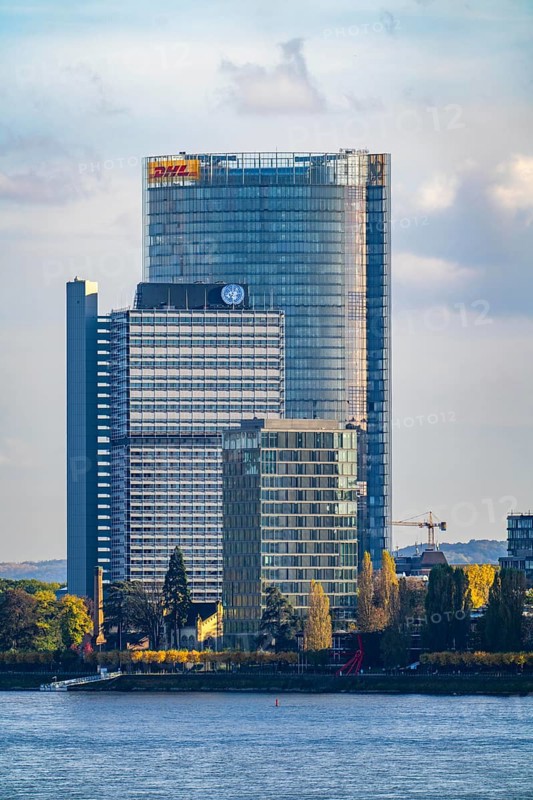 Skyline Bonn on the Rhine, in front the UNFCCC Secretariat of the Framework Convention on Climate Change, in the centre the high-rise building of the United Nations, Campus Bonn, behind it the Posttower, corporate headquarters of Deutsche Post, North Rhine-Westphalia, Germany, Europe
