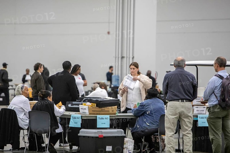 Detroit, Michigan USA, 5 November 2024, City of Detroit election workers count absentee ballots on election day at the city's convention center