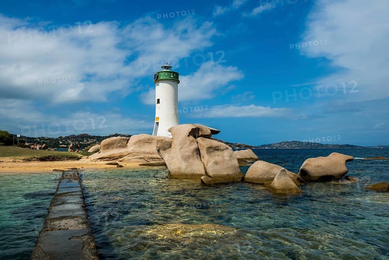 Lighthouse with beach and bizarre granite rocks, Spiaggia Porto Faro, Faro di Punta Palau, Palau, Costa Smeralda, Sardinia, Italy, Oceania