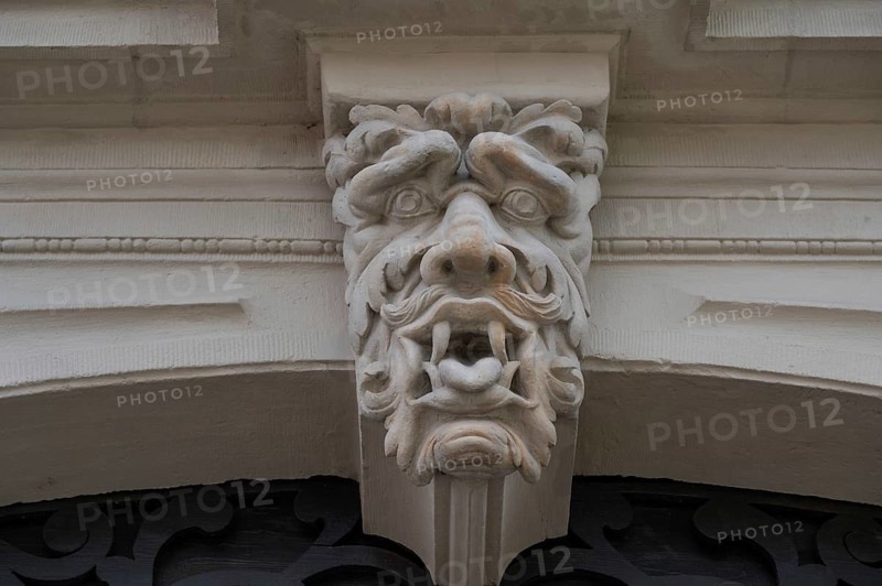 Grotesque above the entrance portal of the Knaufmuseum, Marktpl., Iphofen, Lower Franconia, Bavaria, Germany, Europe