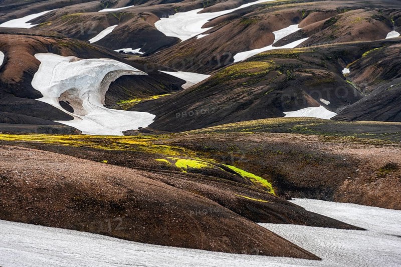 Volcanic landscape with hills and snow, Laugavegur trekking trail, Landmannalaugar, Fjallabak Nature Reserve, Icelandic Highlands, Suðurland, Iceland, Europe