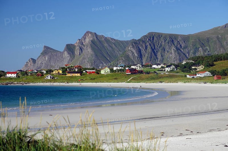 Village off Bergen with colourful houses on a white sandy beach on a sunny day, blue water, Ramberg, Flakstad, Lofoten, Nordland, Norway, Europe