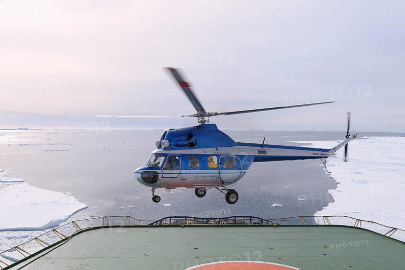 Helicopter takeofft on deck of Icebreaker Kapitan Khlebnikov, Snow hill island, Weddel Sea, Antarctic Peninsula, Antarctica