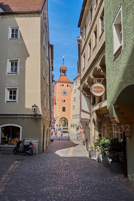 View of the Brückstraße and the Brückturm in the historic city of Regensburg, Bavaria Germany