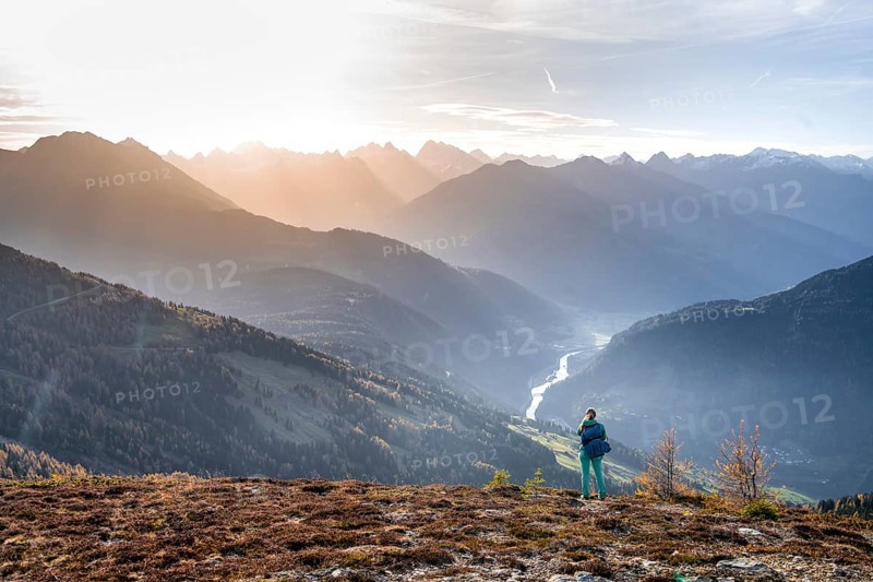 Hiker on the Venet, Upper Inn Valley in the morning light, view from Venet, Ötztal Alps, Tyrol, Austria, Europe