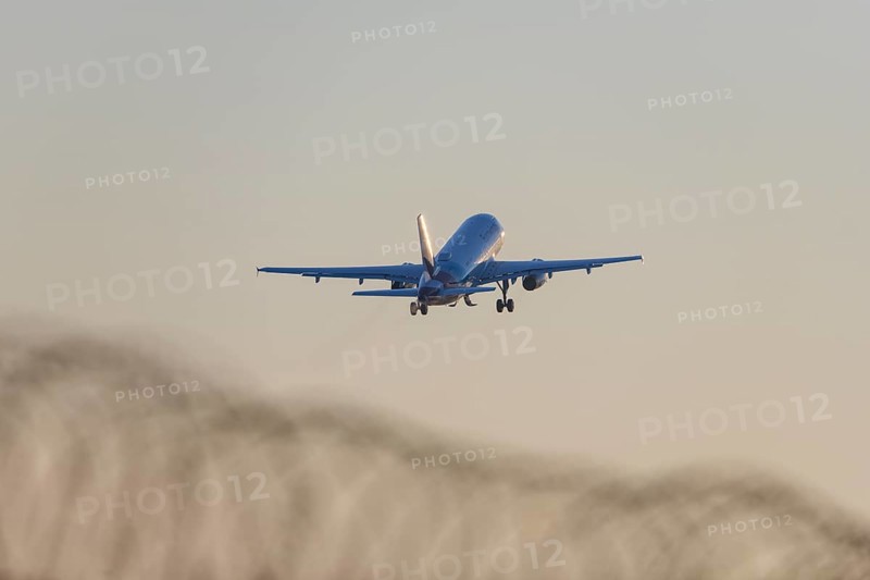 Symbolic image, deportation flights of illegal and delinquent migrants, passenger aircraft, airport, security fence, barbed wire, Germany, Europe