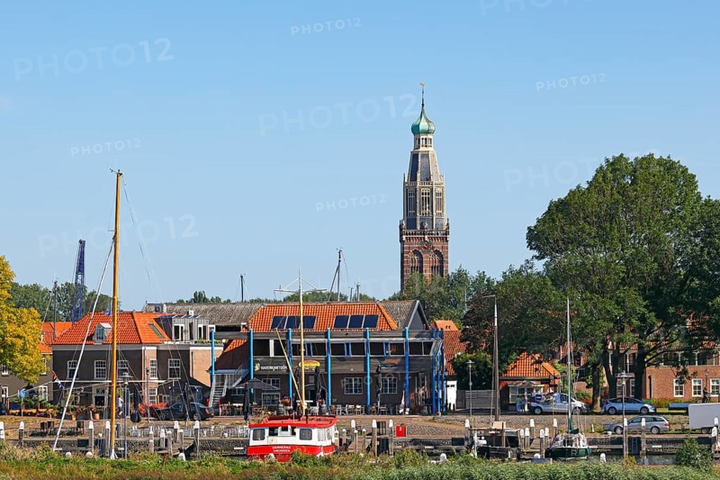 Small harbour and town view of Enkhuizen with tower of the Zuiderkerk church, Enkhuizen, North Holland, West Friesland, Netherlands