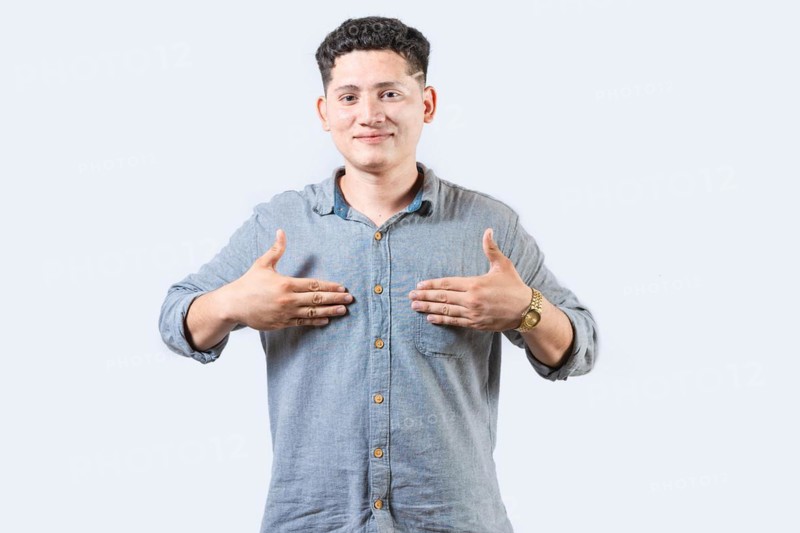 Interpreter person gesturing HAPPINESS in sign language. Smiling young man gesturing HAPPINESS in sign language