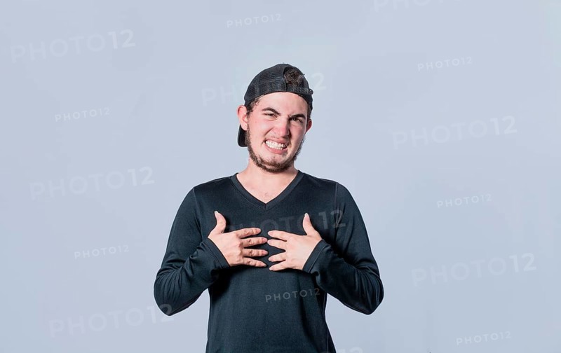 Guy with disgust expression, man with disgust expression with hands on his chest, man with disgust face isolated