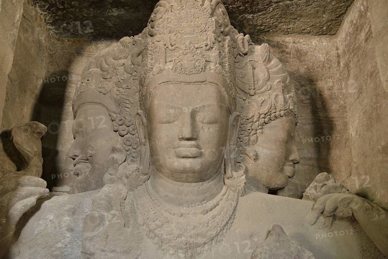 Figure of a three-headed Shiva in the main cave of the Shiva temple on Elephanta Island, UNESCO World Heritage Site, Mumbai, Maharashtra, India, Asia