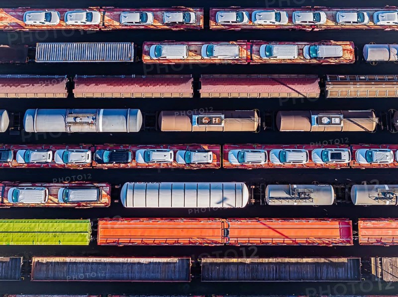 Deutsche Bahn AG marshalling yard. Many goods trains are parked on the tracks with tank wagons, car transporters and other wagons, companies transport a considerable part of their freight by rail, aerial view, Germany, Europe
