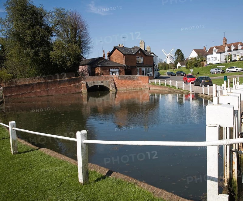 Pond and historic buildings in the attractive tourist honeypot village of Finchingfield, Essex, England, United Kingdom, Europe