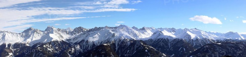 Alpine panorama with snow-covered mountain peaks in winter. Taken in the ski resort of Serfaus Fiss Ladis (Tyrol, Austria)