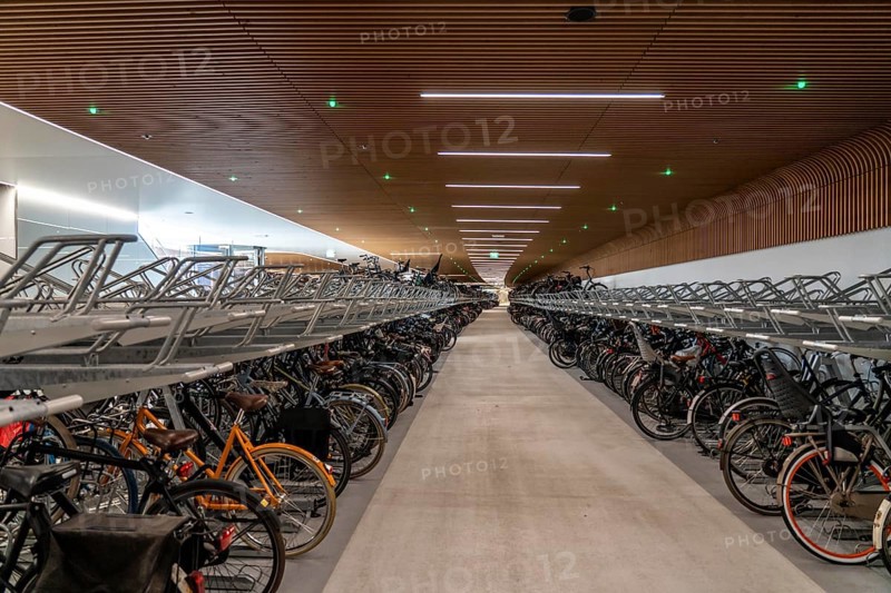 New bicycle car park at Amsterdam Central Station, IJboulevard, space for around 4000 bicycles, digitally monitored, underground, direct connection to the station, built into the water of the IJ, at the back of the station, Netherlands