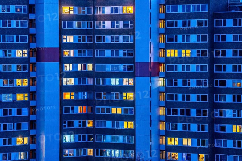 High-rise buildings in the Bensberg residential park, Bergisch-Gladbach, 18-storey housing estate with over 900 flats spread over 7 building complexes, dusk, illuminated windows, North Rhine-Westphalia, Germany, Europe
