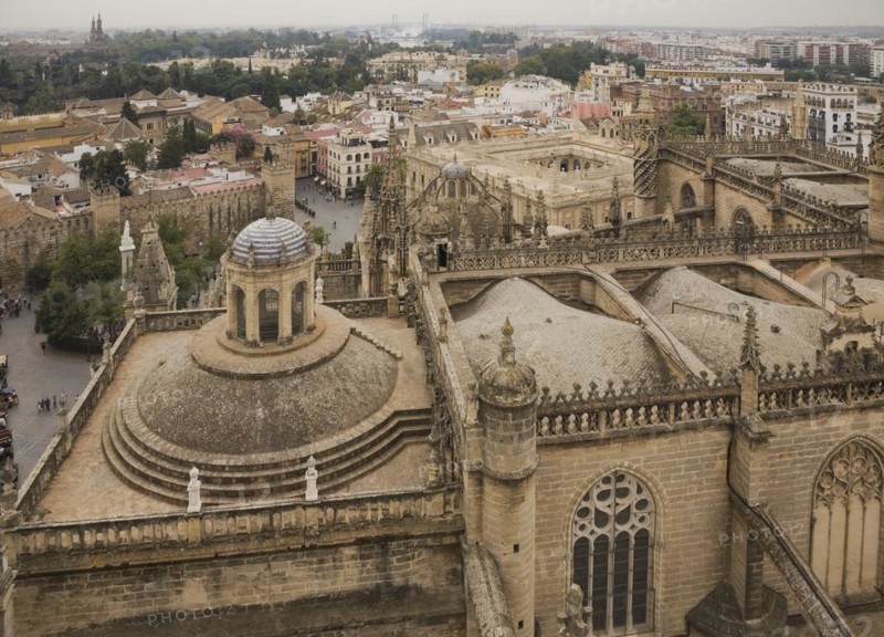 High angle view of The Cathedral of Saint Mary of the See or Seville Cathedral and city skyline from the tower, Seville, Spain, Europe