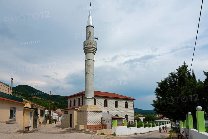 View of a mosque with a slender minaret on a street with pedestrians, Melivia, Melivoia, centre of the Pomaks, Myki, Xanthi, Eastern Macedonia and Thrace, Greece, Europe