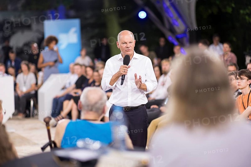 Olaf Scholz (Chancellor of the Federal Republic of Germany, SPD) surrounded by guests at the Chancellor's meeting at ufaFabrik in Berlin on 4 September 2024