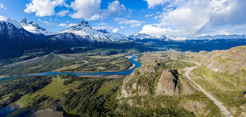 Confluence of river Estero Parada flowing into Rio Ibanez, aerial view, snow-capped mountains in early spring, Patagonie, Chile, South America