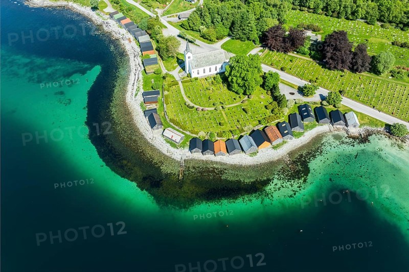 Aerial view of beach and church in Selje, wooden boat sheds, Stad, Vestland, Norway, Europe