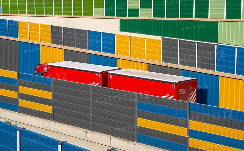 Colourful noise barriers on the A52 motorway, at the Essen-Rüttenscheid junction, the noise barriers were rebuilt in a colourful design as part of the motorway renovation, North Rhine-Westphalia, Germany, Europe