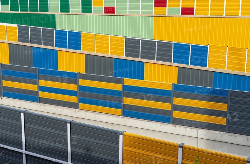 Colourful noise barriers on the A52 motorway, at the Essen-Rüttenscheid junction, the noise barriers were rebuilt in a colourful design as part of the motorway renovation, North Rhine-Westphalia, Germany, Europe