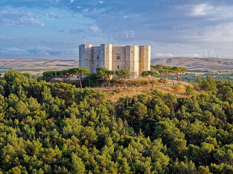 The Castel del Monte, an octagonal hilltop castle from the 13th century, stands on a wooded hill in the Andria region. The building is a national monument of Italy and a UNESCO World Heritage Site. Andria, Apulia, Southern Italy, Southern Europe