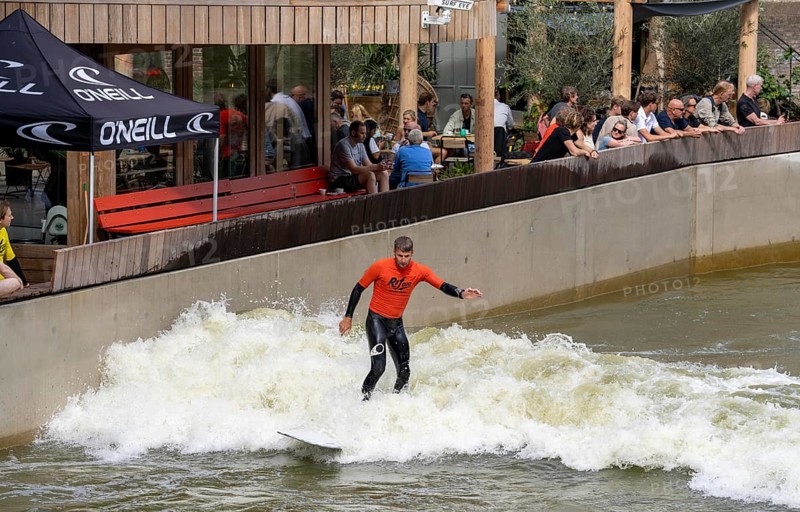 Surfing facility in the city centre of Rotterdam, Rif010, supposedly the world's first wave facility for surfers in a city, in the Steigersgracht, a 130 metre long and 21 metre wide wave pool was built in the existing canal, waves up to 1.5 metres high can be generated, every 7 seconds a wave breaks for the surfers, the 4.5 million litres in the pool, water is moved by 8 wave machines, Netherlands
