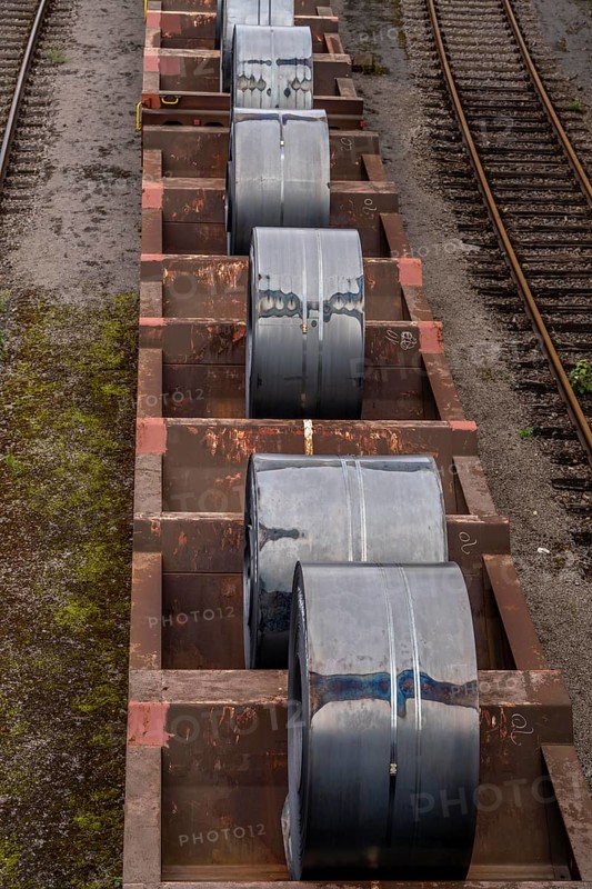 Strip steel coils, on freight wagons, at the ThyssenKrupp Steel plant Schwelgern in Duisburg-Marxloh is part of the Bruckhausen steelworks, North Rhine-Westphalia, Germany, Europe