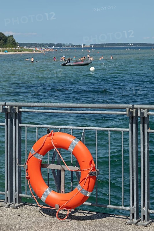 Lifebuoy, ferry pier, inflatable boat, people, Falckenstein, Kiel, Kiel Fjord, Schleswig-Holstein, Germany, Europe