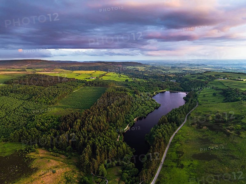 Sunset over Cod Beck Reservoir from a drone, North York Moors National Park, North Yorkshire, England, United Kingdom, Europe