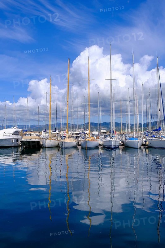 Water reflection, sailing boats in the harbour of Saint Tropez, Var, French Riviera, Provence-Alpes-Cote d'Azur, Cote d Azur, France, Europe