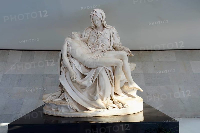 Pieta, The Blessed Virgin Mary statue with the dead body of the Christ, Roman Cathedral of Brasilia or Metropolitan Cathedral of Our Lady of Aparecida, designed by Oscar Niemeyer, World Heritage Site, Brasilia, Federal district, Brazil, South America