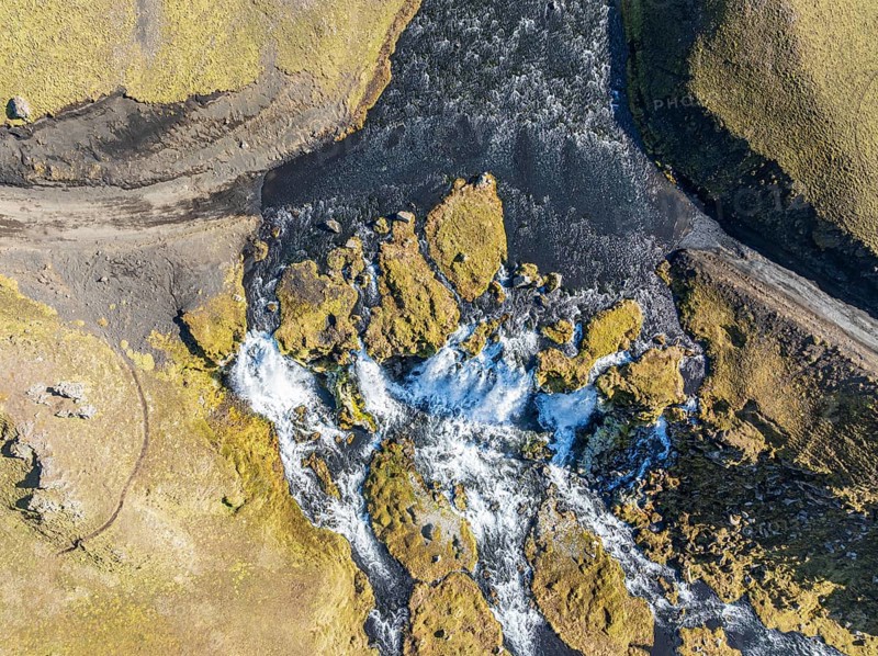 Road F232 Öldufellsleid, ford at waterfall of river bláfjallakvísl, northern slopes of moss-covered Mt. Öldufell, black lava sand, Iceland, Europe