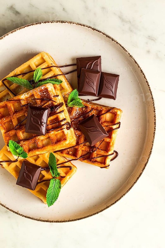 Viennese waffles, with chocolate, breakfast, on a beige background, no people, selective focus, waffles, dessert, chocolate, mint