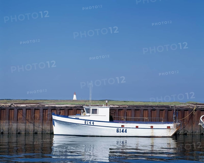 Moored fishing boat in Le Goulet harbour, New Brunswick, Canada, North America