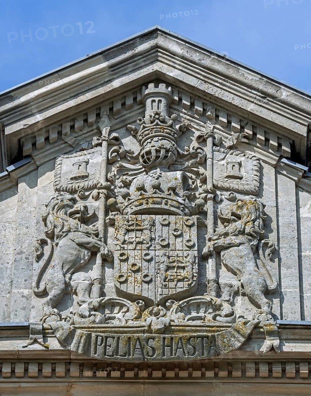 High relief coat of arms of 1750 Poeke Castle, Kasteel van Poeke in Rococo style near Aalter, East Flanders, Belgium, Europe