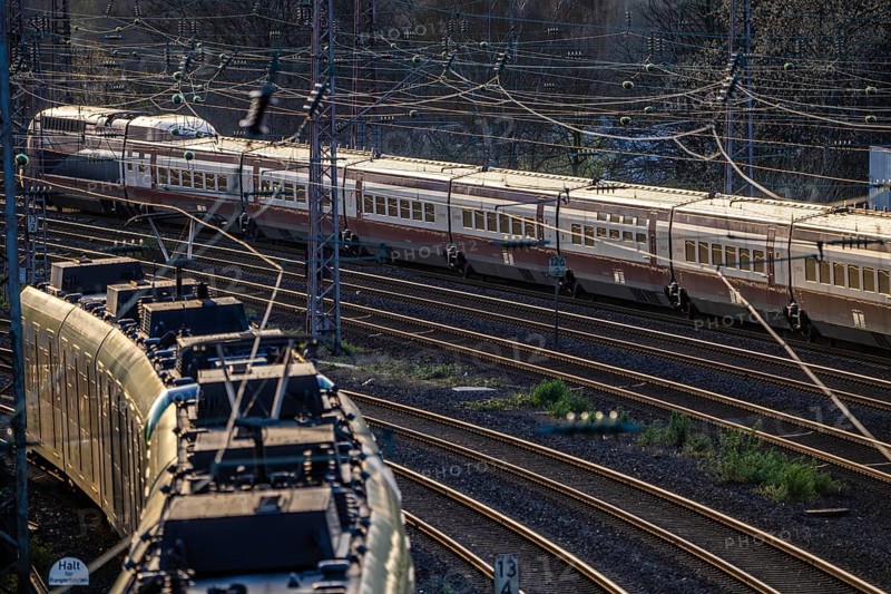 S-Bahn and Eurostar train on the tracks, railway layout, railway line west of the main station of Essen, North Rhine-Westphalia, Germany, Europe