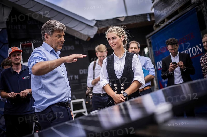 Federal Minister for Economic Affairs and Climate Protection Robert Habeck (Alliance 90/The Greens) on a summer tour of Germany. Here in Bochum, 10 July 2024, visiting a roofer with solar roof elements Photographed on behalf of the BMWK
