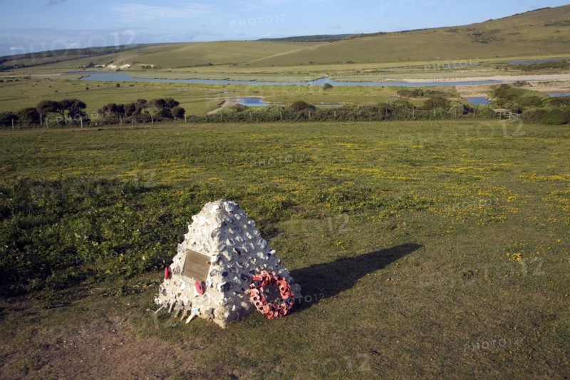 View north east over River Cuckmere valley from Seaford Head, East Sussex, England. Canadian war memorial